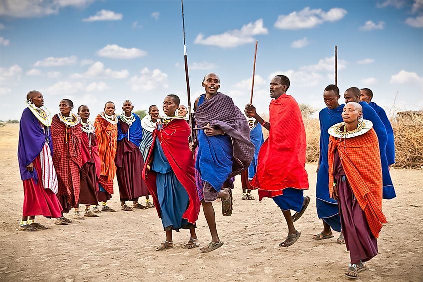 15 groups of ethnic people in Tanzania doing their traditional dance to welcome tourists